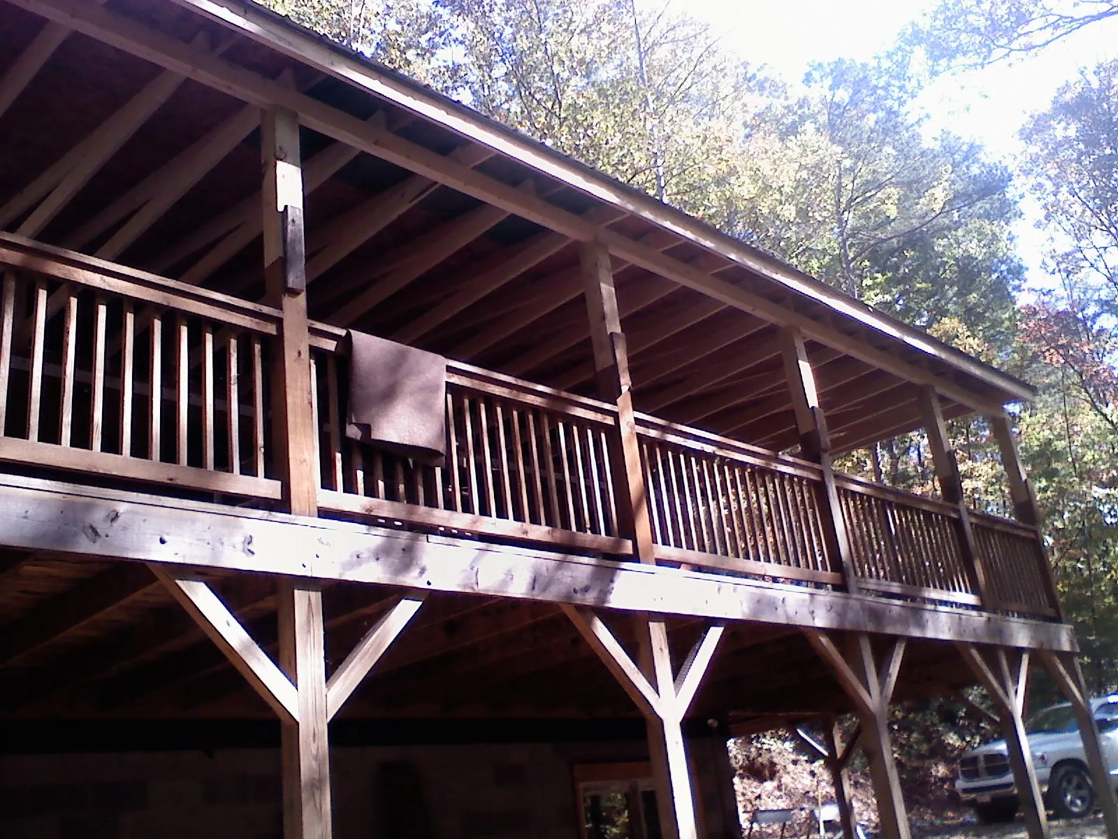 Timber framing under a new elevated porch and deck — Roof Leak Repair in Beyer by Roofing Brothers